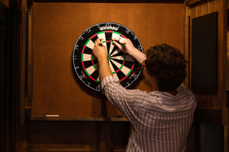 Dart borad being payed